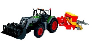 Traktor z turem i siewnikiem